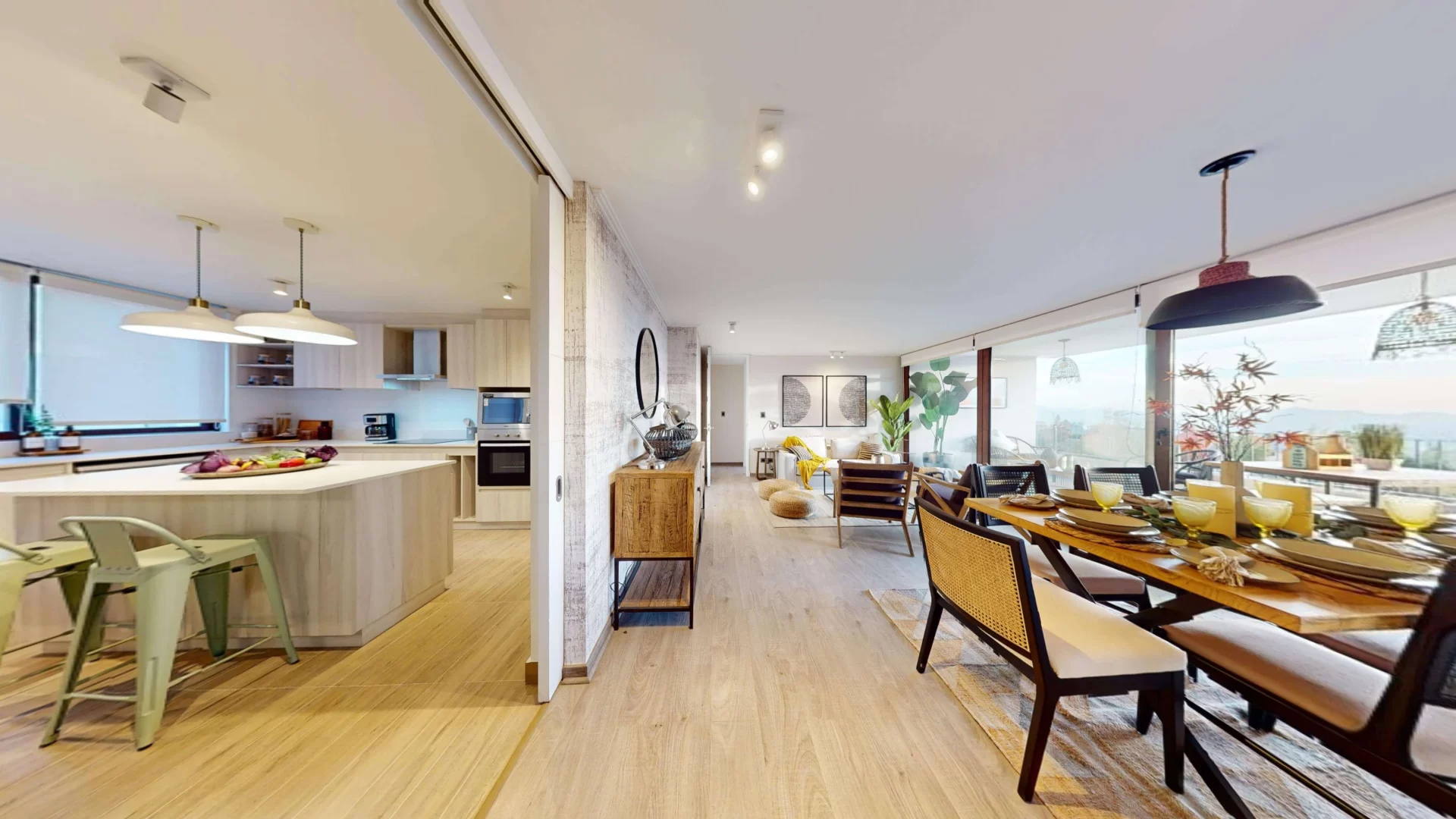 Cocina integrada al living comedor, con vista al oriente