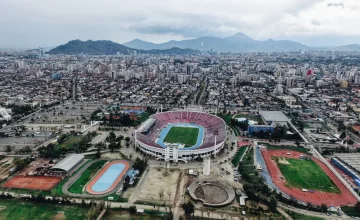 Vista aérea del Estadio Nacional y sus alrededores, destacando el valor y plusvalía para vivir en Ñuñoa.